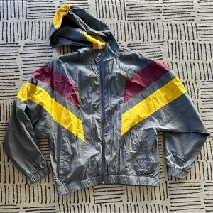 Women’s grey windbreaker with Yellow and purple Accents